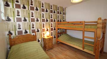 Schlafzimmer 4 - Einzelbett + Etagenbett