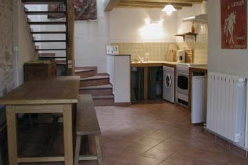 Wohn- und Esszimmer mit offener Küche