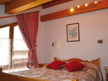 Schlafzimmer in der Ferienwohnung Champagny