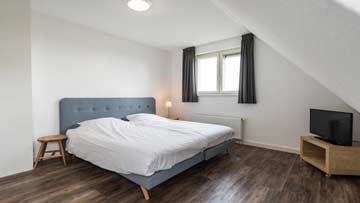 Schlafzimmer 3 - Doppelbett mit TV