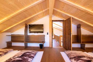 Mehr als ein -Matratzenlager- das 4-Bett-Zimmer im Alphütten-Stil